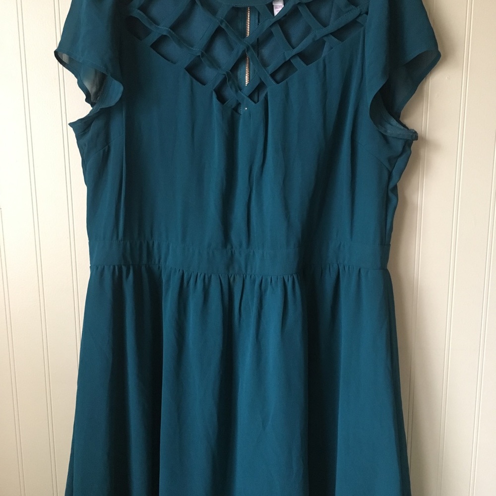Emerald green dress with details on the front!